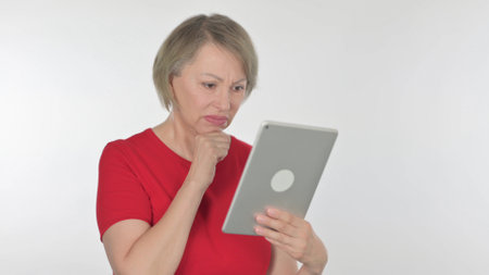 Old Woman Reacting to Loss on Tablet on White Background