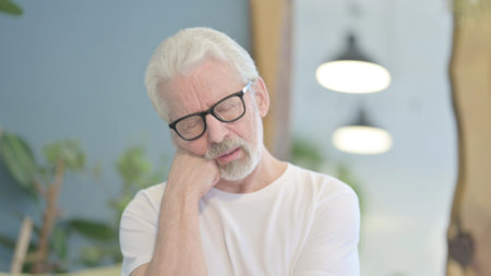 Portrait of Tired Senior Old Man Sleepingの写真素材