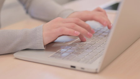 Close up of Creative Woman Typing on Laptopの写真素材