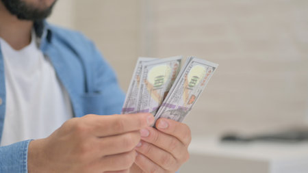 Close up of Man Counting Money, Income