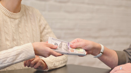 Close up of Woman Giving Money