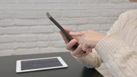 Close up of Browsing Internet on Smartphone