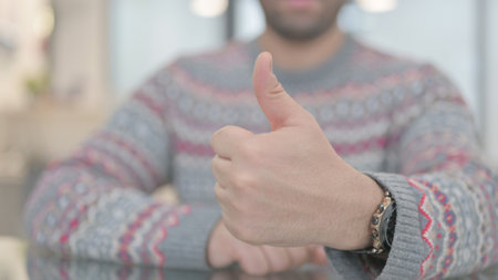 Hand Close Up of Thumbs Up