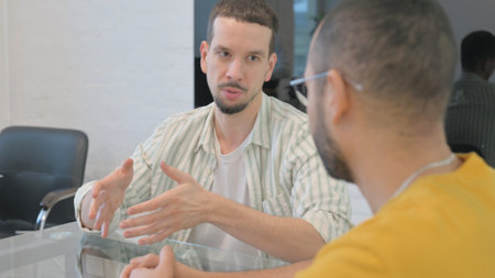 Close up of Creative People Talking at Work