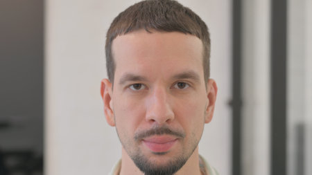 Close up of Serious Young Man Face