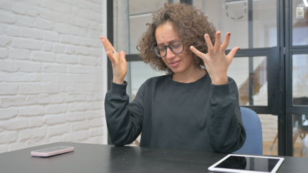Stressed Hispanic Woman Feeling Frustrated and Lost