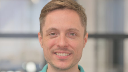 Close up of Smiling Mature Adult Man Face