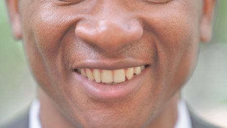 Smiling Lips of Young African Businessman