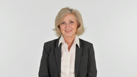 Smiling Senior Business Woman on White Background