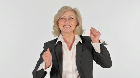 Dancing Senior Business Woman on White Backgroundの写真素材