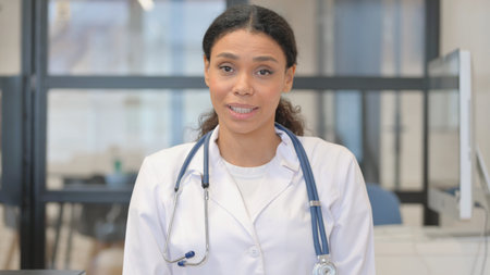 African Female Doctor Doing Video Chat, Webcam View