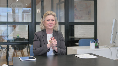 Angry Senior Old Business Woman Feeling Frustrated in Office