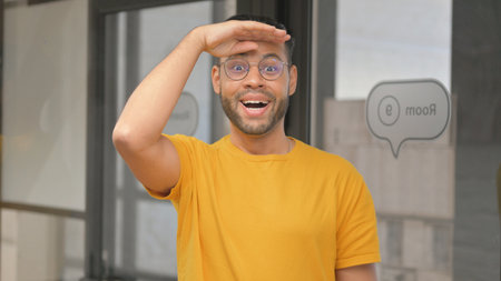 Casual Young African Man Searching for New Opportunity in Work
