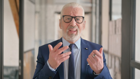 Portrait of mature businessman reactingの写真素材