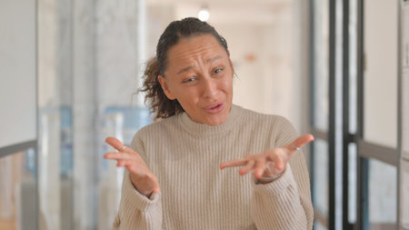 Portrait of Unsatisfied Multiracial Woman Fighting in Argument