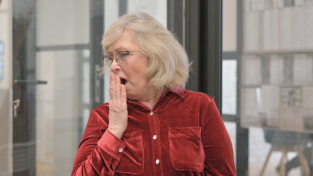 Portrait of Yawning Senior Old Woman Need Rest, Workload