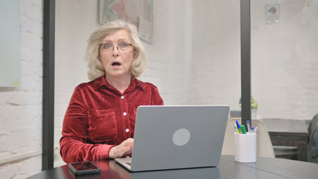 Surprised Senior Adult Woman Shocked while Looking at Camera