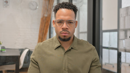 Portrait of Serious Mature Adult Hispanic Man