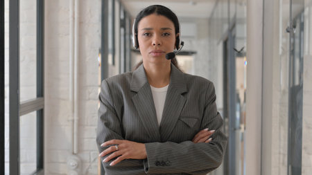 Portrait of African Woman with Headset in Call Centerの写真素材