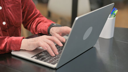 Hand Close up of Old Woman Typing on Laptop