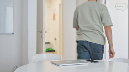 Man Leaving Workspace, Getting Late for Meeting