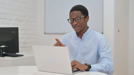 Online Video Chat by Young African Businessman