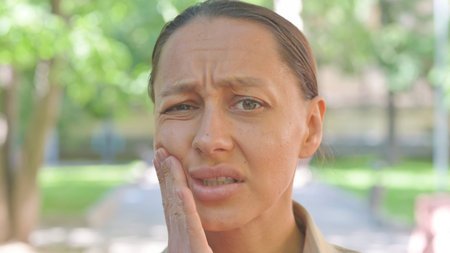 Woman with Toothache or Facial Painの写真素材