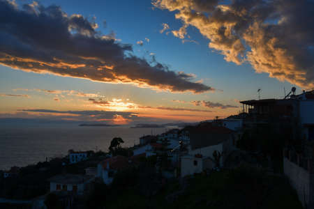 Beautiful sunset sky over western Skopelos, Sporades islands, Greeceの写真素材