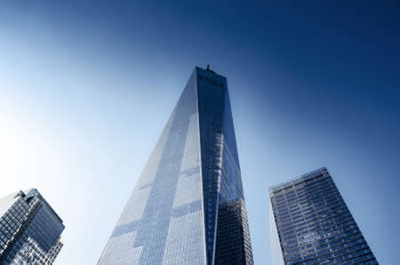 The One World Trade center or Freedom Tower located in New York City. Architectural modern buildings at lower Manhattan skyline in United States of Americaの写真素材