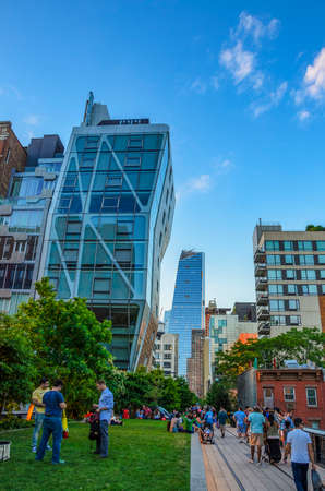 Panoramic view of New York city Buildings walking on the High Line. It is a 1.45-mile-long elevated...