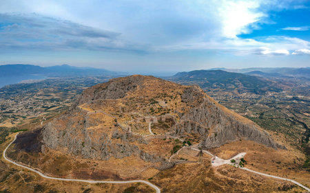 Aerial view of Acrocorinth "Upper Corinth" the acropolis of ancient Corinth, Greece. It is a monolithic rock overseeing the ancient city of Corinth and Its the most impressive of the acropoleis of mainland Greeceのeditorial素材