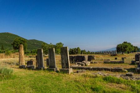 Messini, Greece - June 20 2021: Ruins in the Ancient Messene archeological site, Peloponnese, Greece. One of the best preserved ancient cities in Greece with visible remains dating back further than the 4th century BC.のeditorial素材
