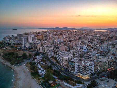 Aerial panorama view over the famous Marina Zeas, Peiraeus at sunset. Marina Zeas is a small crowded circular port with boats docked in Peiraeus city and a top tourist attraction in Greece.のeditorial素材