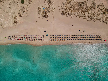 Aerial view of Simos beach in Elafonisos island in Greece. Elafonisos is a small Greek island the Peloponnese with idyllic exotic beaches and crystal clear waters. Laconia, Greece, Europeの写真素材