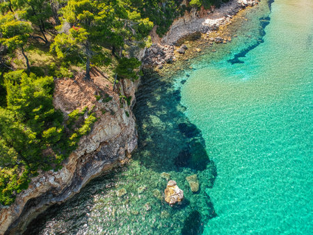 Aerial view over Chrisi Milia beach and the rocky surrounded area in Alonissos island, Sporades, Greeceの写真素材