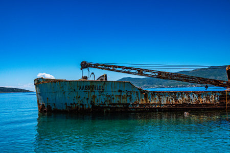 Seaside view over rusty shipwreck of an old cargo ship at Peristera island near Alonissos, Sporades, Greeceの写真素材