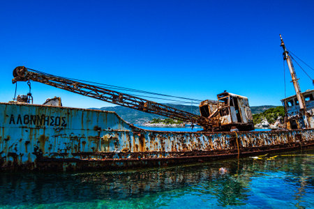 Seaside view over rusty shipwreck of an old cargo ship at Peristera island near Alonissos, Sporades, Greeceの写真素材