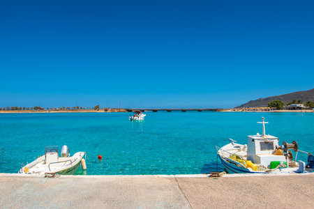 Traditional wooden fishing boats in Diakofti harbor in Kythira island, Greece, Europeの写真素材
