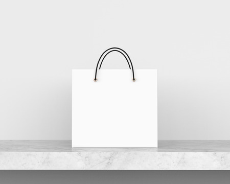 Blank isolated white bag mockup template in 3d render on marble stone tableの写真素材