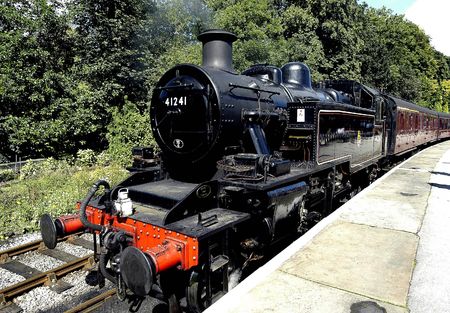 Steam train in station                        