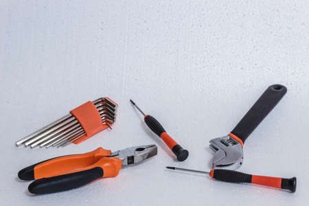 A set of tools for construction and repair, lying on a white background from the top view.の写真素材