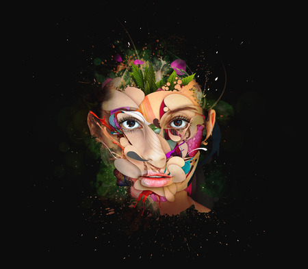beauty fashion model face close up inside colorful paint in abstract shapes. Water color spreading. Fantastic shapes in black background.の写真素材