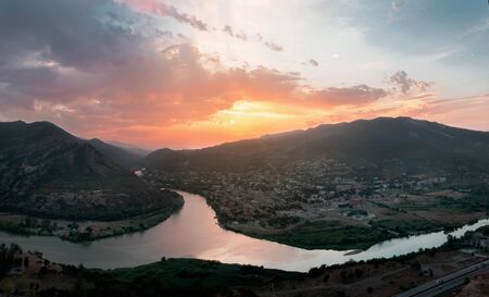 Top View Of Mtskheta, Georgia, The Old Town on sunset, panoramaの写真素材