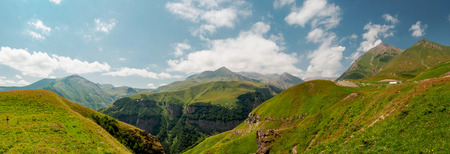 Georgian mountines with blue sky panoramic wiewの写真素材