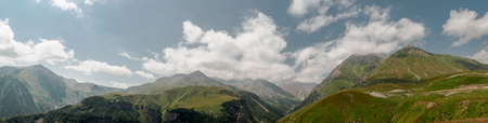 Georgian mountines with blue sky panoramic wiewの写真素材