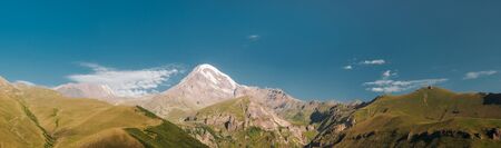 Amazing view of Kazbek mount on a sunrise panoramic viewの写真素材