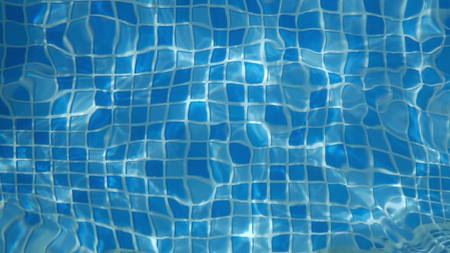 Natural Shiny blue water in a swimming poolの写真素材