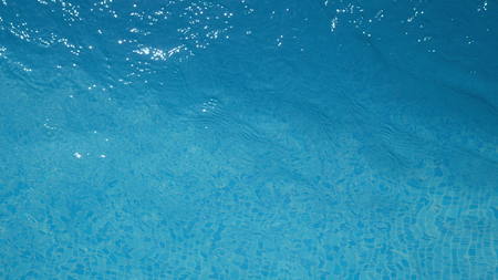 Natural Shiny blue water in a swimming poolの写真素材