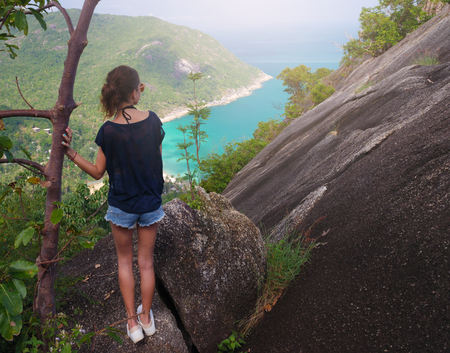 girl enjoy picturesque view of the island at a height. viewpointの写真素材