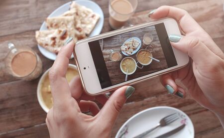 Food photo of indian food on wooden table for social networksの写真素材